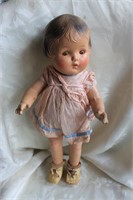 ANTIQUE DOLL WITH CLOSING EYES