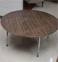 Round table with adjustable height legs. 48ins.