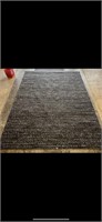9x12 gray and black area rug.
