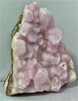 Pink aragonite specimen