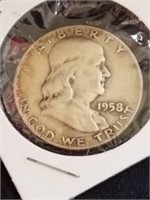 1958 silver half dollar D