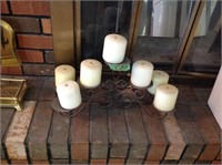 candles on metal base