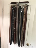 Women’s fashion belts. (18) hanger included.