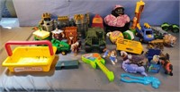 Toy lot including plastic vehicles, horses and