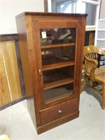 Cabinet with glass front 50" high  x24 wide