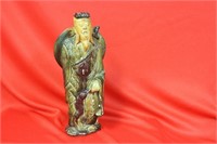 An Old Ceramic Chinese Figurine