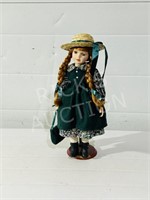 Porcelain doll on stand - 18"