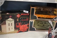 PIKO VILLAGE AND 2 VINTAGE RAIL ROAD CARS