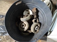 Bucket of Misc. Iron Wheels