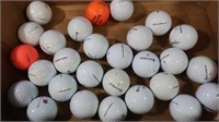 28 used TaylorMade Golf Balls