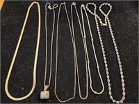 6 sterling silver necklaces marked "935".