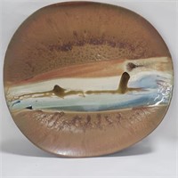 Signed pottery center dish