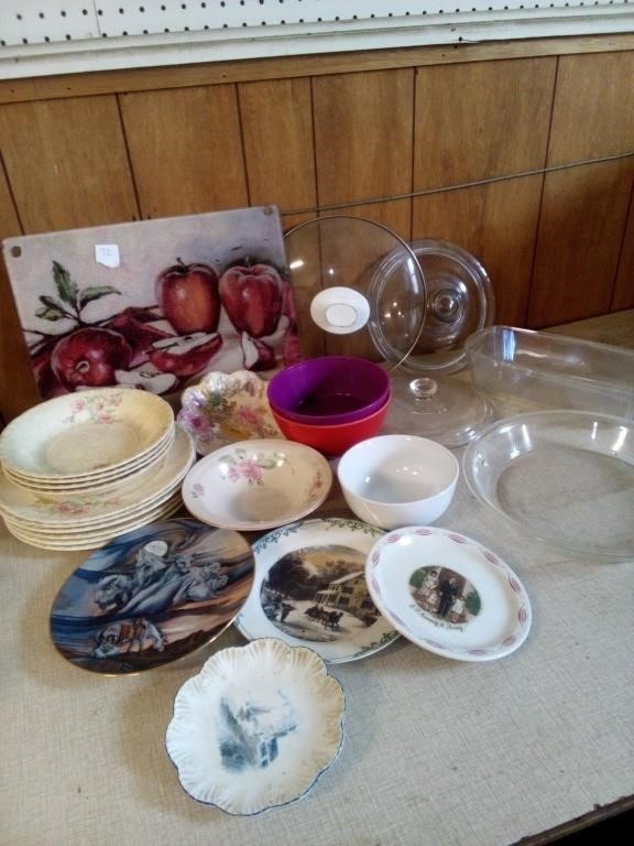A lot of kitchenware, plates, Apple cutting