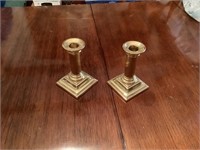 Pair of gold candleholders