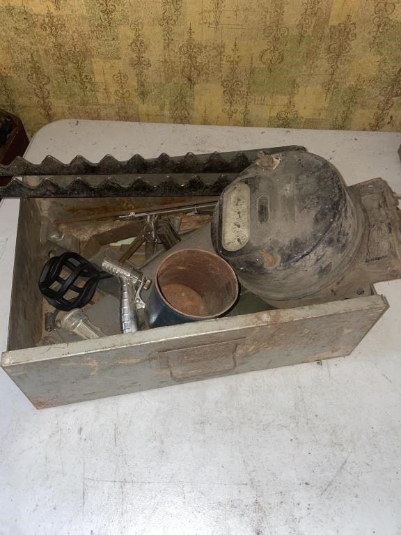 Metal drawer, old meter, garden hose items, metal