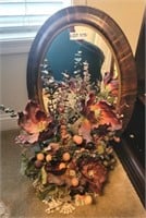 Oval Wall Mirror & Floral Arrangement