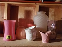 Assorted pink glassware, teacups, vases, pottery,