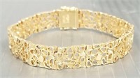 14K gold modern design bracelet marked