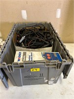 tote of spark plug wires and brake parts