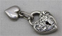 Sterling Silver heart charm. Weight 2.82 grams.