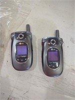 Pair of LG flip phones with chargers