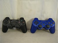 2 count PS3 dualshock wireless controllers