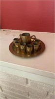 Small brass cup set