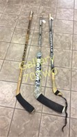 Selection of signed game used hockey sticks – one