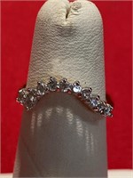 Curved CZ ring with white stones. Size 6