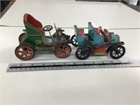 2 tin cars made in Japan