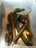 Tub of irons and tools