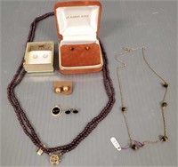 Group of jewelry including garnet necklace with
