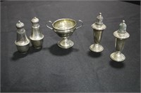 4 Sterling weighted salt and pepper shakers and a