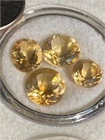 Faceted amber colored stones
