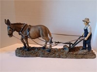 18 inch resin statuette mule and farmer plowing.
