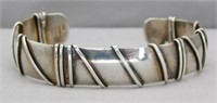 STERLING SILVER BRACELET WITH WRAPPED CORD