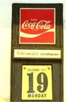 COKE ADV SIGN WITH A CALANDER PAD