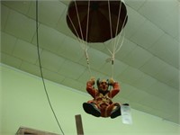 Hanging clown parachute figure.