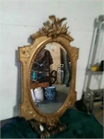 Ornate carved frame wall mirror