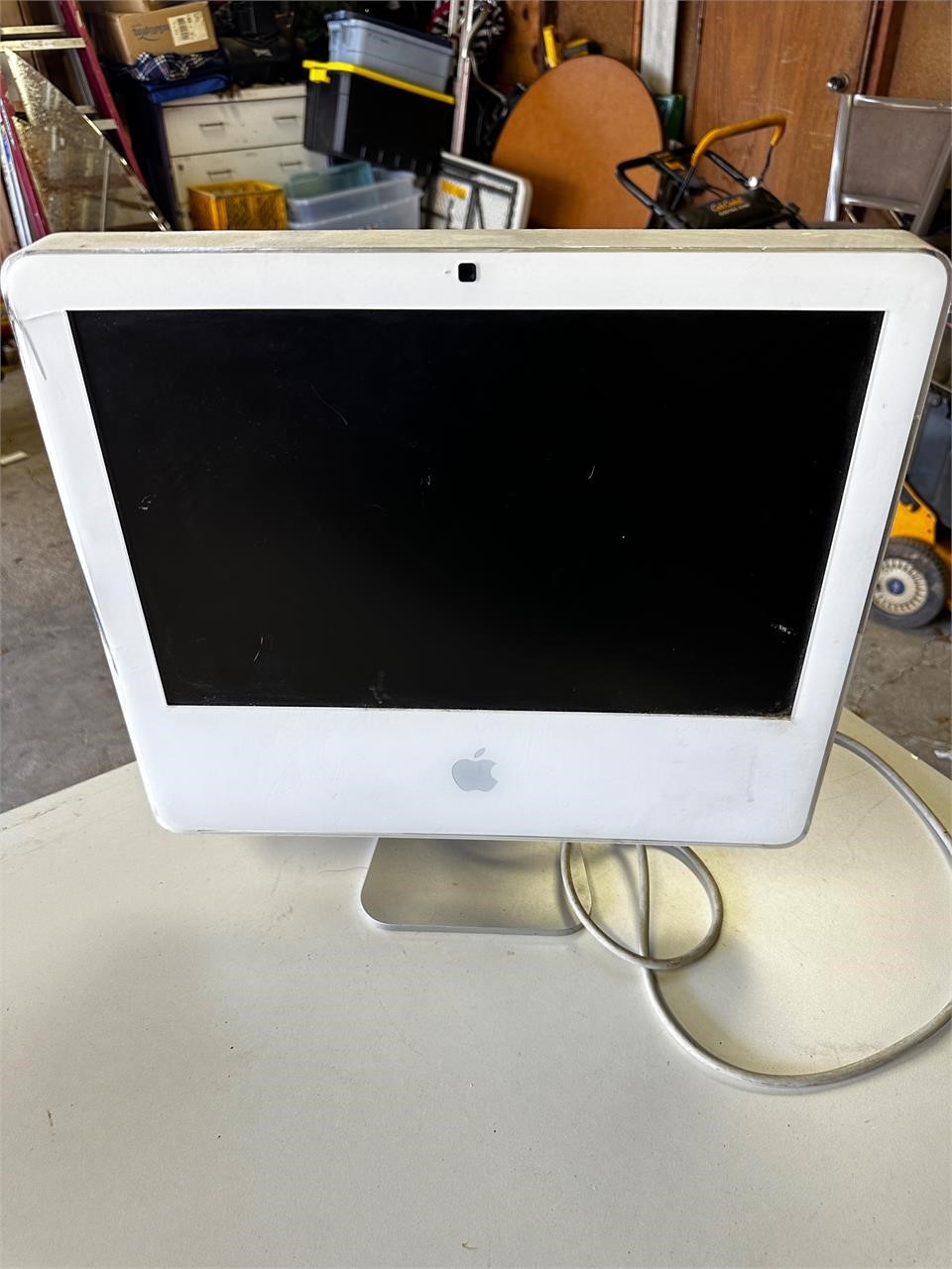 iMac computer with cord - cracked corner