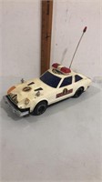Vintage battery operated large police car.  For