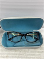 Warby Parker glasses case with Versace glasses