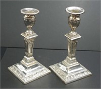 Pair of George V sterling silver candlesticks