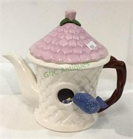 Ceramic birdhouse themed teapot measuring 7 1/2