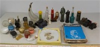 Assortment of Avon bottles and Mother's Day plate