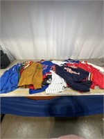 Large assortment of assorted sports jerseys
