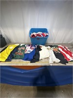 Large tote of assorted sports jerseys