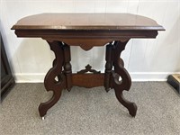 Eastlake walnut lamp table from the 1890s with