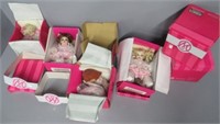 Marie Osmond dolls that includes Peace Rosebud,