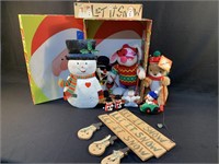 Group of Christmas decor including Let It Snow